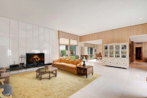 A living room with a fireplace
