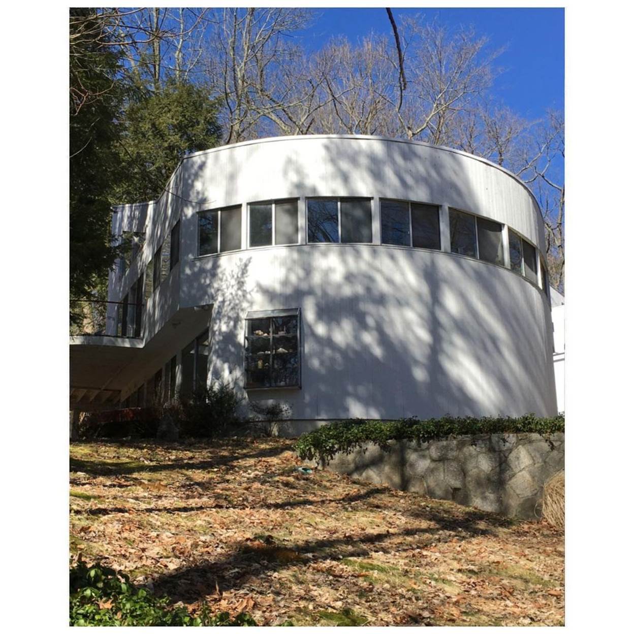 A white building with many windows
