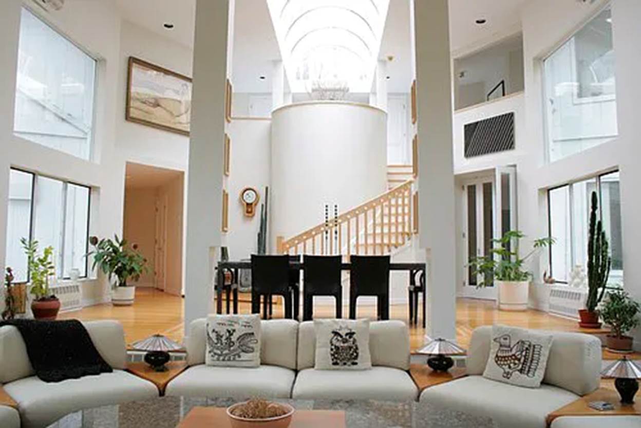 A living room with a large staircase
