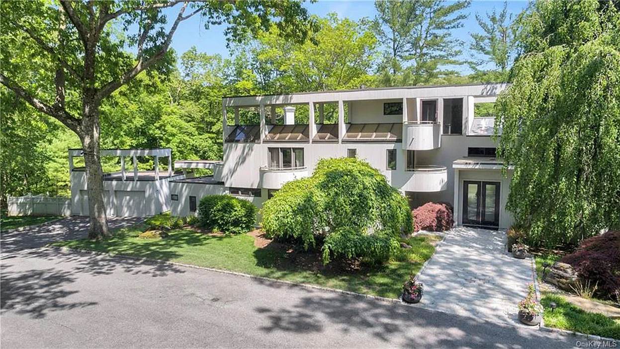 A house with trees around it
